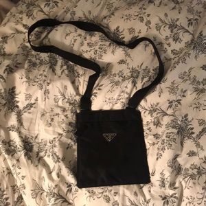 Black crossbody Prada bag
